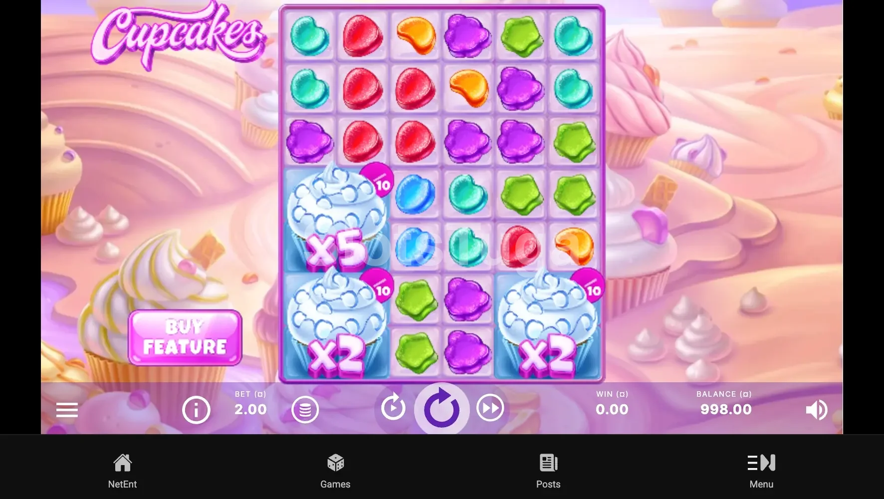 Jogo base da slot Cupcakes da NetEnt com grid colorido