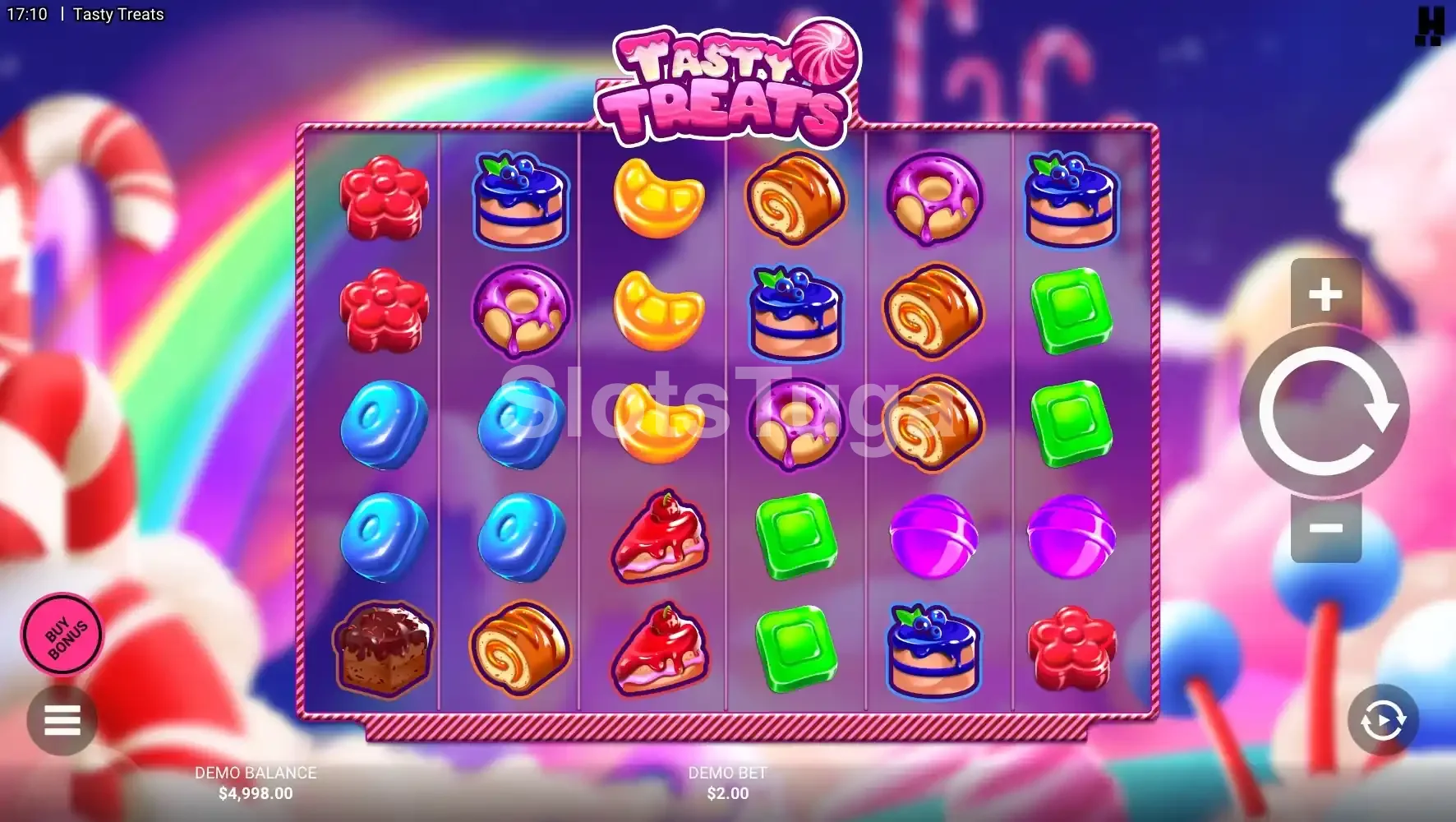 Jogo base da slot Tasty Treats com grade cheia de doces coloridos